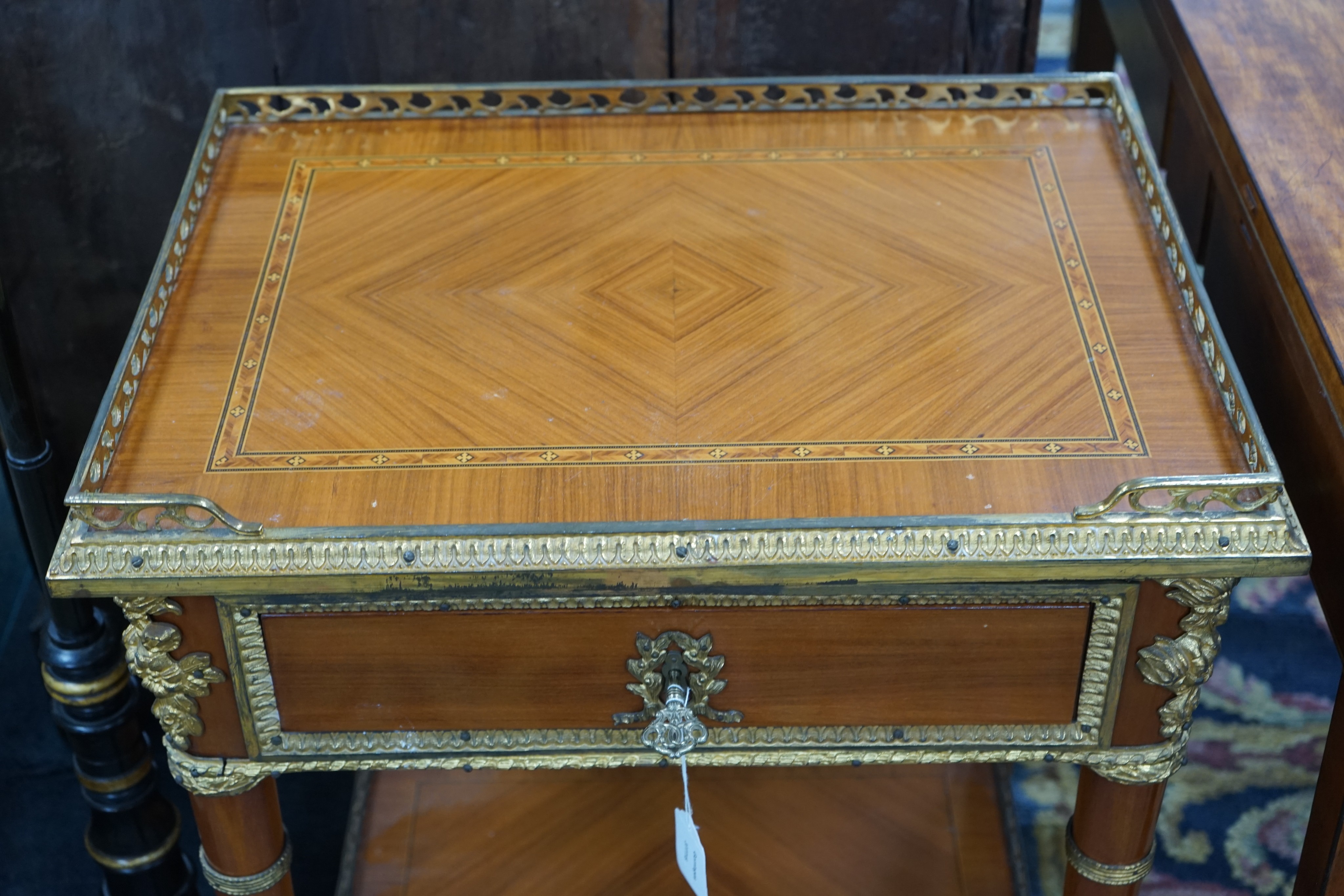 A Louis XVI design gilt metal mounted side table, width 60cm, depth 44cm, height 74cm